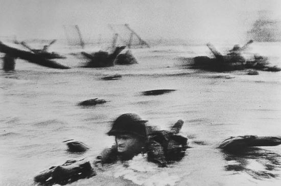Robert Capa © International Center of Photography
FRANCE. Normandy. June 6th, 1944. US troops assault Omaha Beach during the D-Day landings