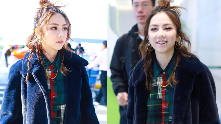 邓紫棋穿貂绒大衣现身机场 丸子头+小辫子可爱满分