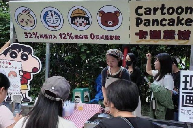▲“卡通手绘煎饼”摊主小曾