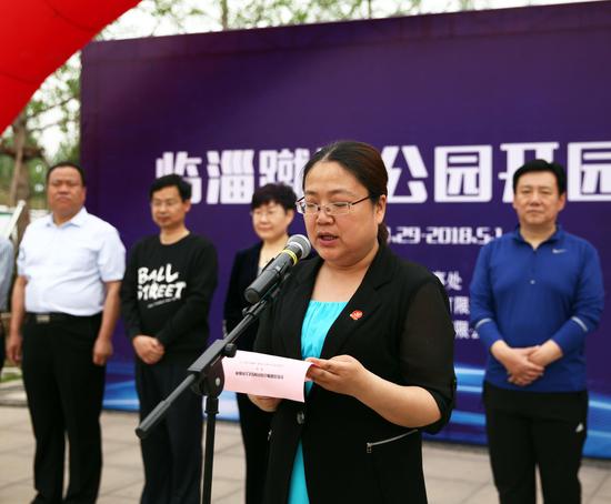 副区长李玲致开幕辞.区委常委,宣传部部长国爱梅宣布 开园.