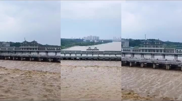 郑州常庄水库正在泄洪 武警官兵连夜加固堤坝封堵管涌