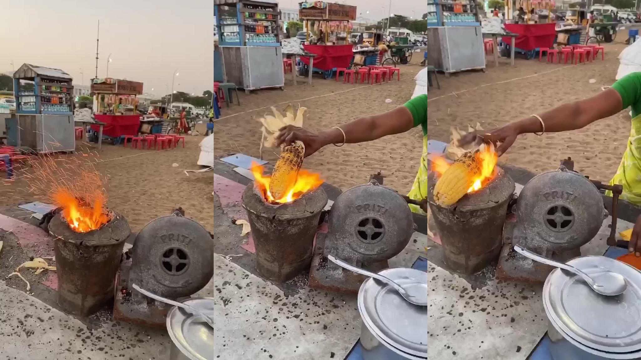 泰国海边卖玉米的小贩,这烤玉米的火炉看着挺有意思