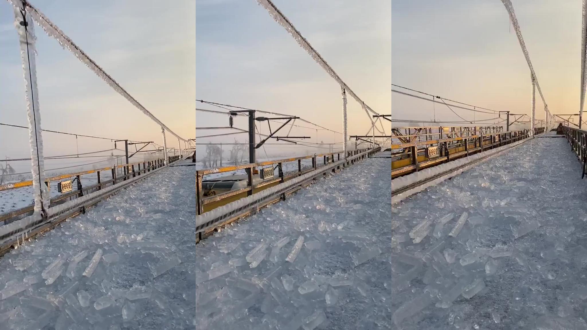 网友:带你近距离看看长吉高铁接触网结冰情况!