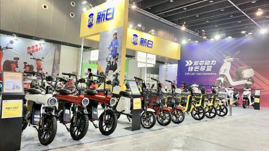 新日电动车义乌展秀肌肉用品质与服务征服用户