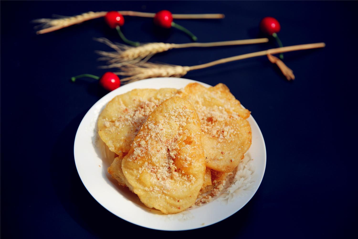 外酥内软的糯米粑粑, 吃起来嘎子作响, 都说再来一份