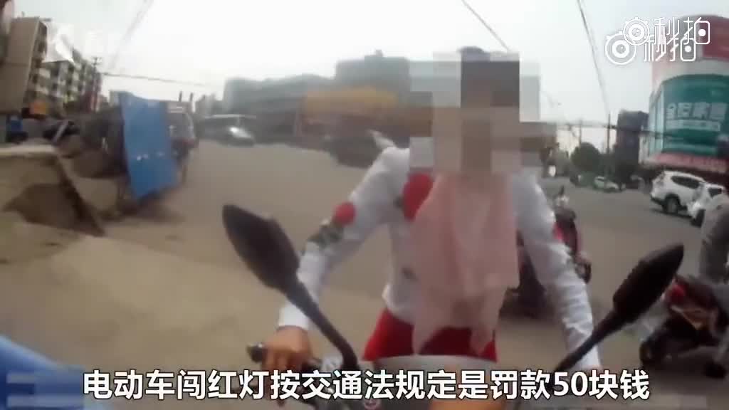 奇葩女闯红灯:女子闯红灯被拦 拒受罚还数落交警:干点实事吧