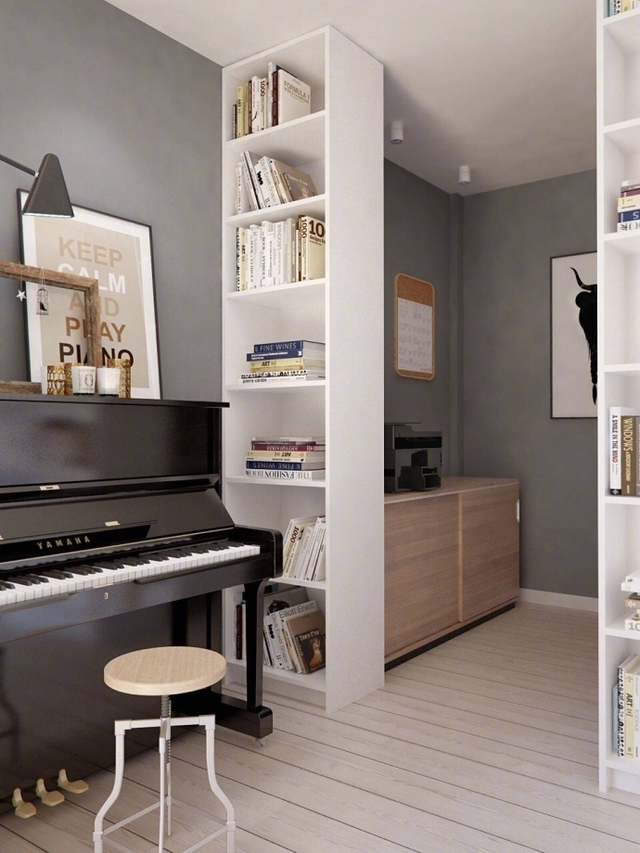 书房是开放式的,旁边有一架钢琴,灰色墙壁彰显女主人高雅,文艺气质.