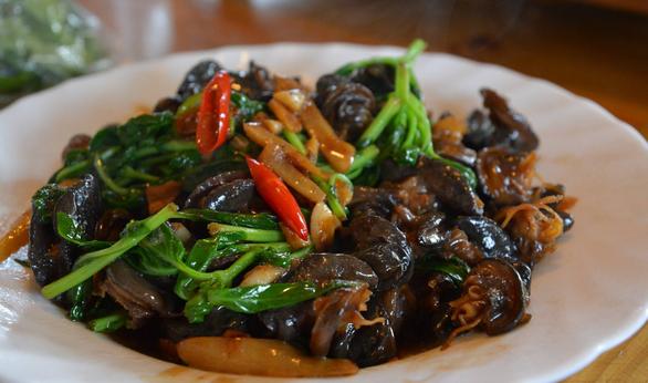 一道穿越的美食,吃出境界,快炒蜗牛有多少人没吃过了?