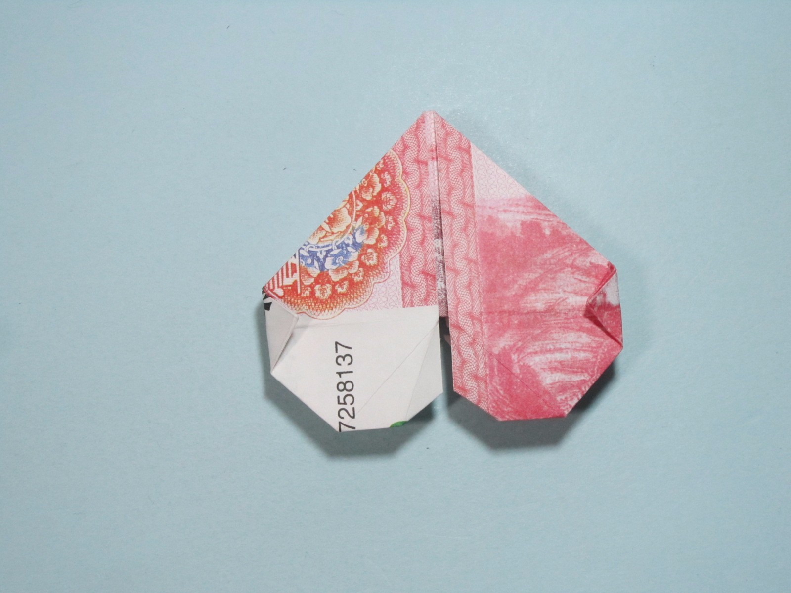 用钱爱心折纸教程图片