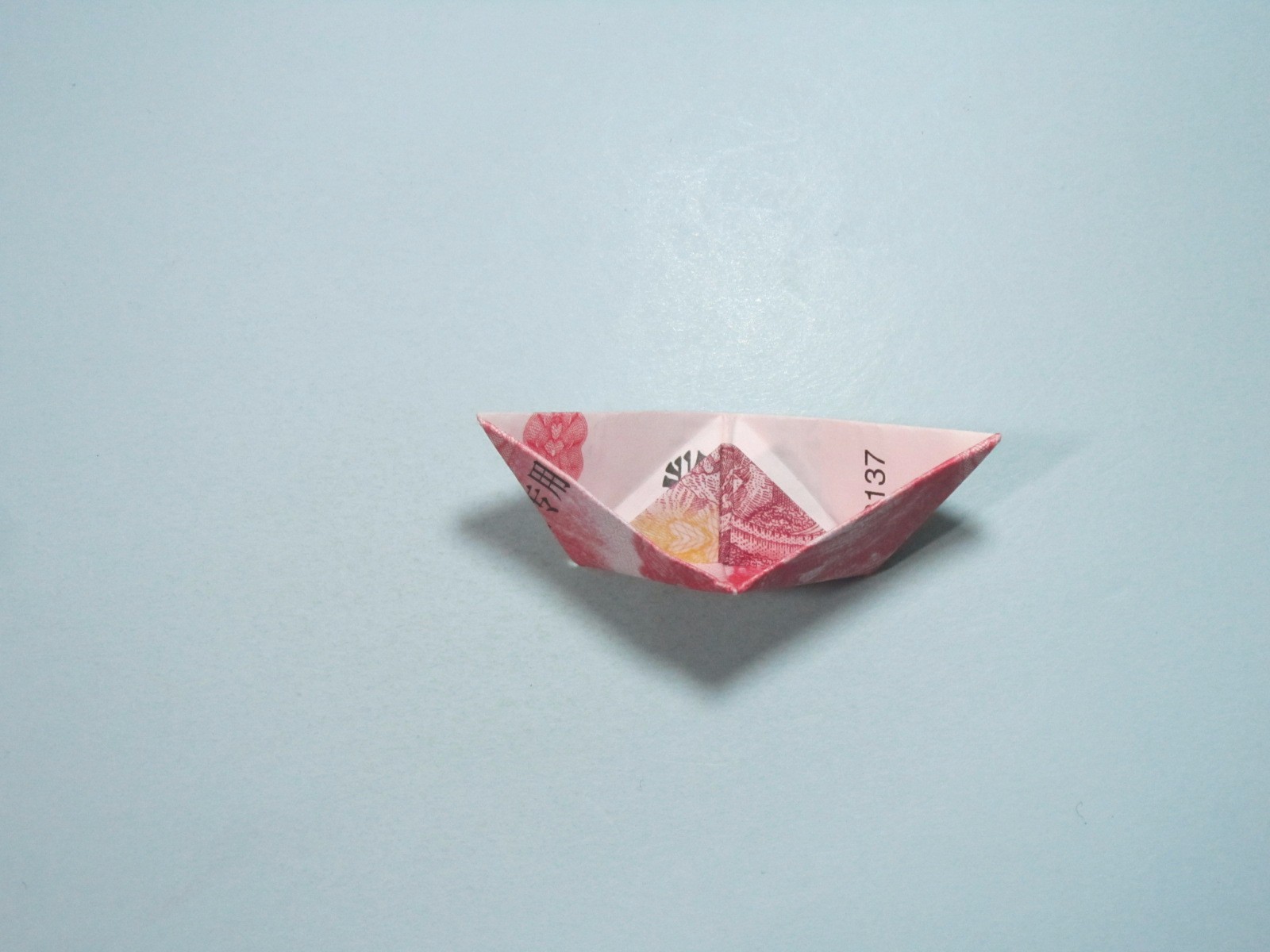 手工折纸小船用人民币折纸小船详细图解教程