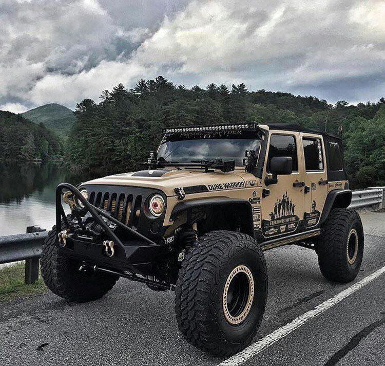 改装后的牧马人__财经头条