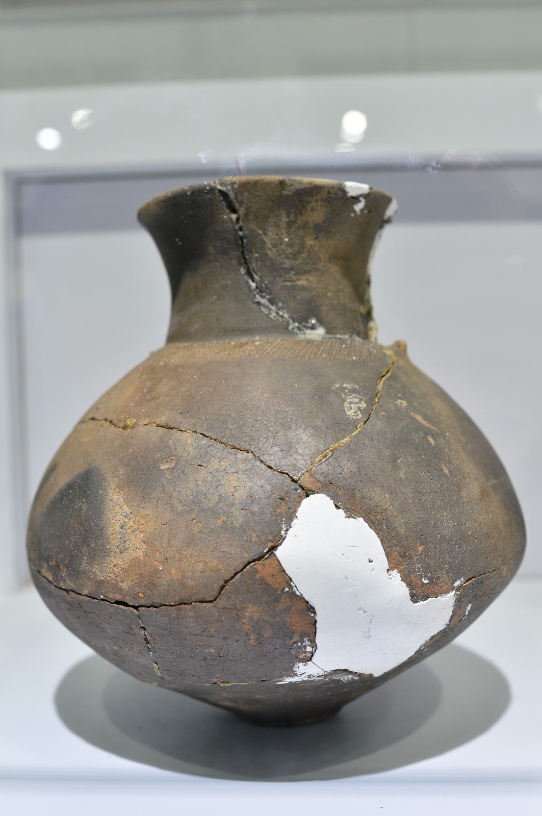 昆明羊甫头文物展展出精美木祖 象征生殖崇拜造型生动