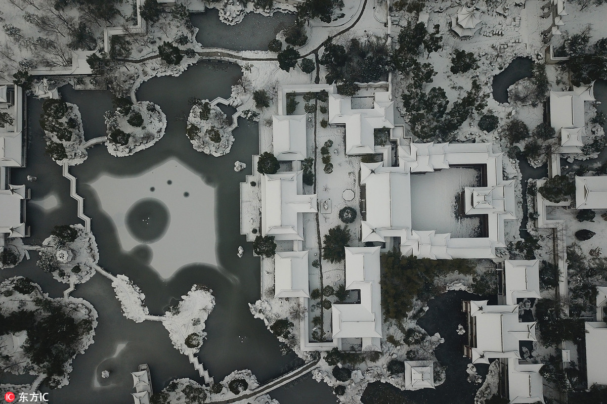 航拍藏身合肥的中国最大私家园林烂尾15年雪中景色不输苏杭