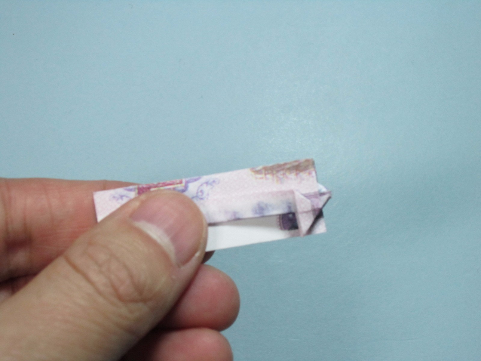 手工折纸戒指如何用人民币折纸蝴蝶戒指详细图解