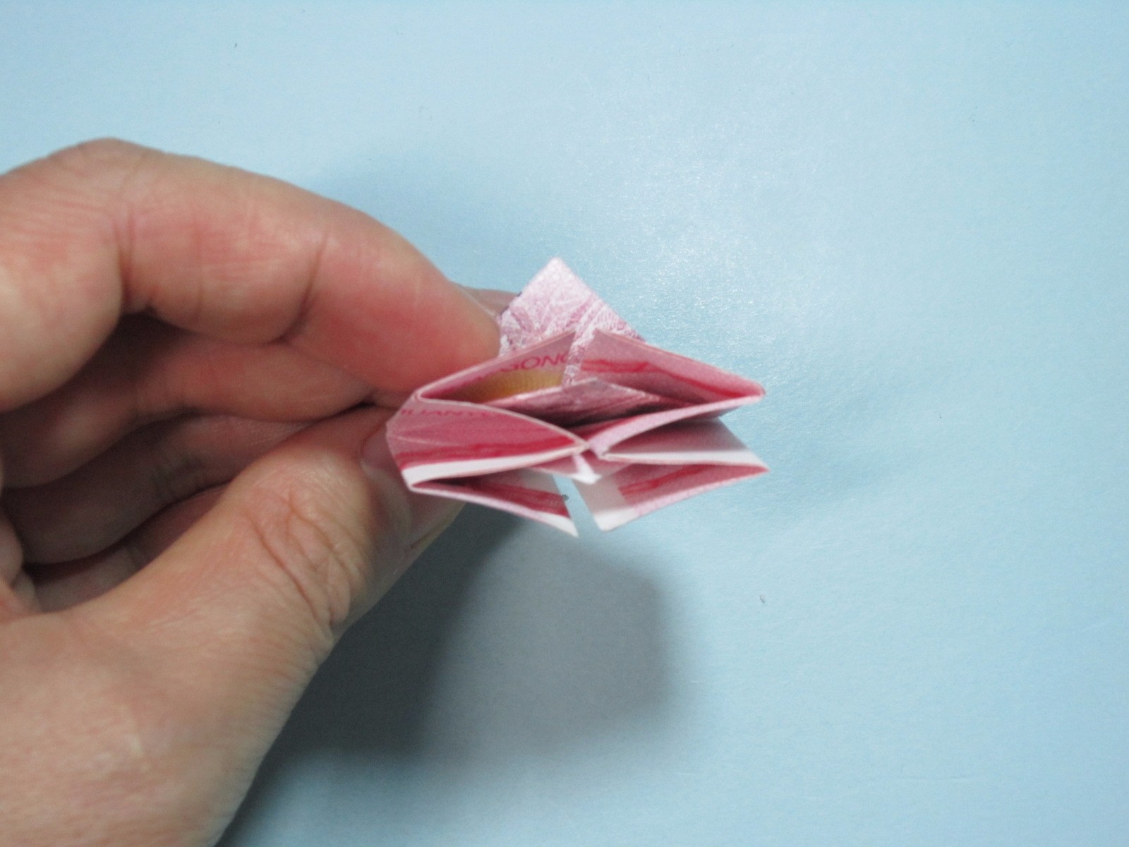 用钱折纸 如何用人民币折纸玫瑰花|玫瑰花|折纸|人民币_新浪新闻