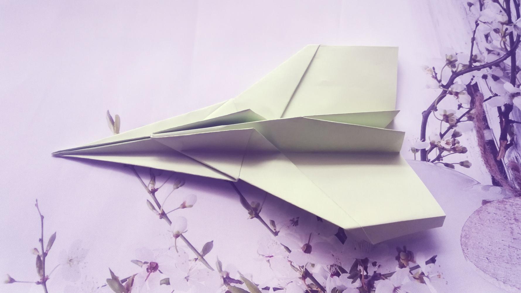 手工折纸: 教大家一款飞的好远的纸飞机, 飞机的折法教程图解!