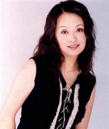 贼王张子强死后, 老婆罗艳芳带走多少亿? 她用6个字正面回复记者