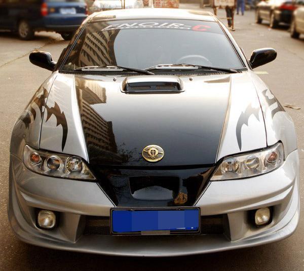 了辆吉利美人豹,但是小伙觉得这车还不够酷,就花2千对这车进行了改装