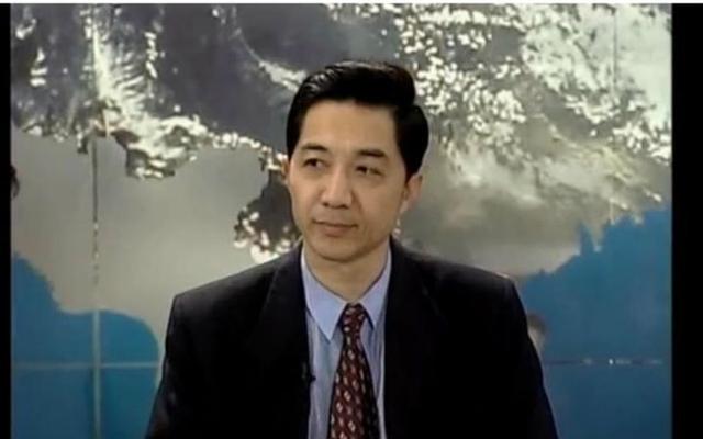 国产航母下水局座为何哭了?看他年轻时照片就知道为什么了