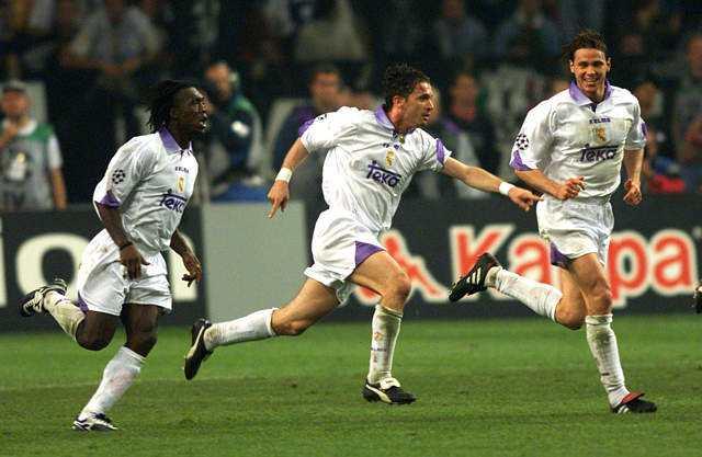 皇马球衣袖子上是紫色小脚板,那是什么品牌?