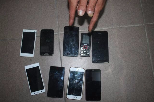 百色平果县公安局破获系列手机被盗案 追回被盗手机二十部
