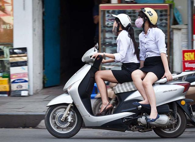 直击越南街头漂亮的摩托女郎,吸引不少游客到来|越南|摩托车|游客