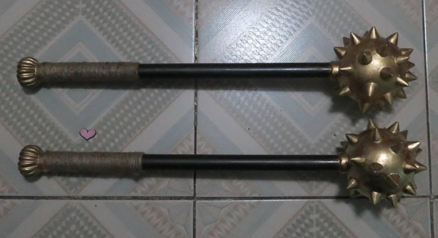 形如狼牙棒,较短.锤面密布狼牙细齿,杀伤力不可小视.