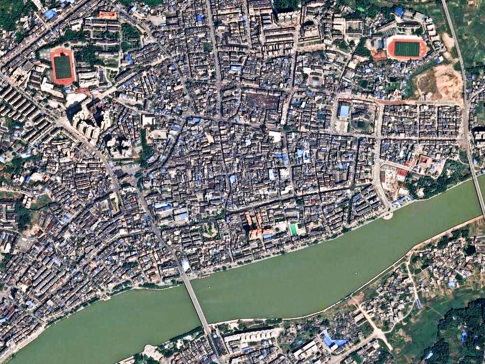 美国"地球眼"卫星看玉林 大容山百米风电机如同牙签