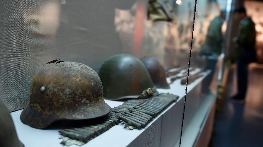 真实抗日战争博物馆照片,图3生锈的王八盒子,图5价值连城