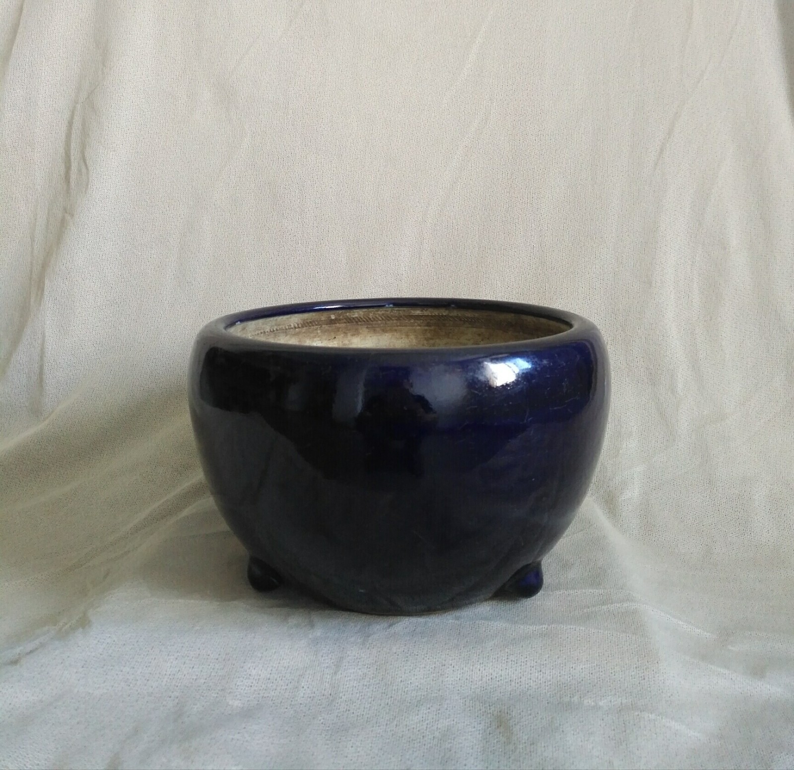 清中早期茄皮紫釉三足香炉