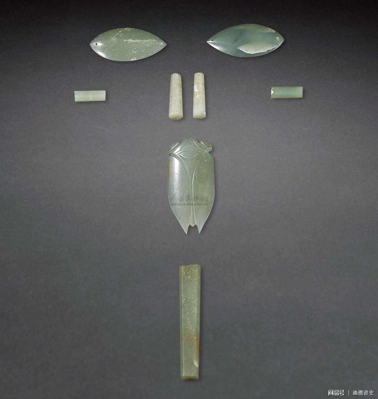 都不会拿走玉器,如果真要拿,也绝对不会拿佩戴在死者身上的"九窍玉"