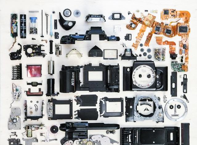 一部相机有多少个零件呢?拆开来谁数一下