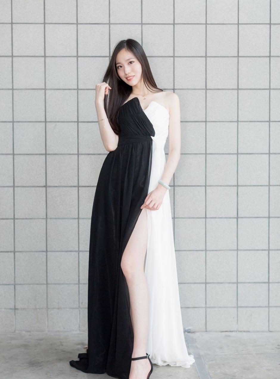 高挑女神一身黑色连衣裙优雅有韵味, 高开叉设计展示白皙大长腿