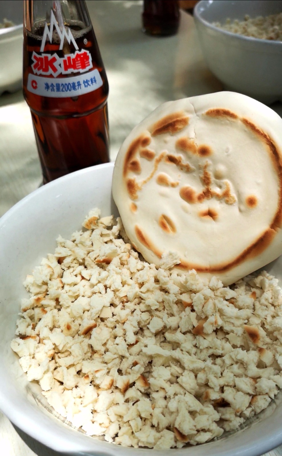 吃饭十分钟,掰馍一小时——羊肉泡馍