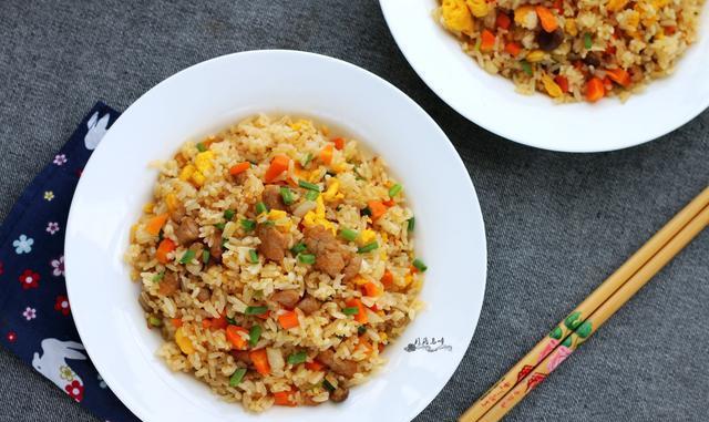 用它来炒饭, 味道特别鲜美, 好吃得不得了, 儿子能吃2大碗