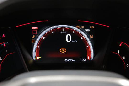 本田缤智1.8在城市道路3公里3处红绿灯平均油耗12个油正常吗?