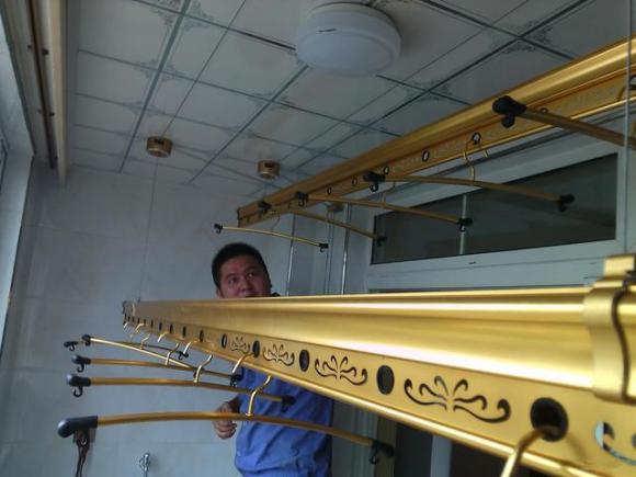 装修三套房才弄明白,阳台晾衣杆固定的好还是升降的,后悔知道晚