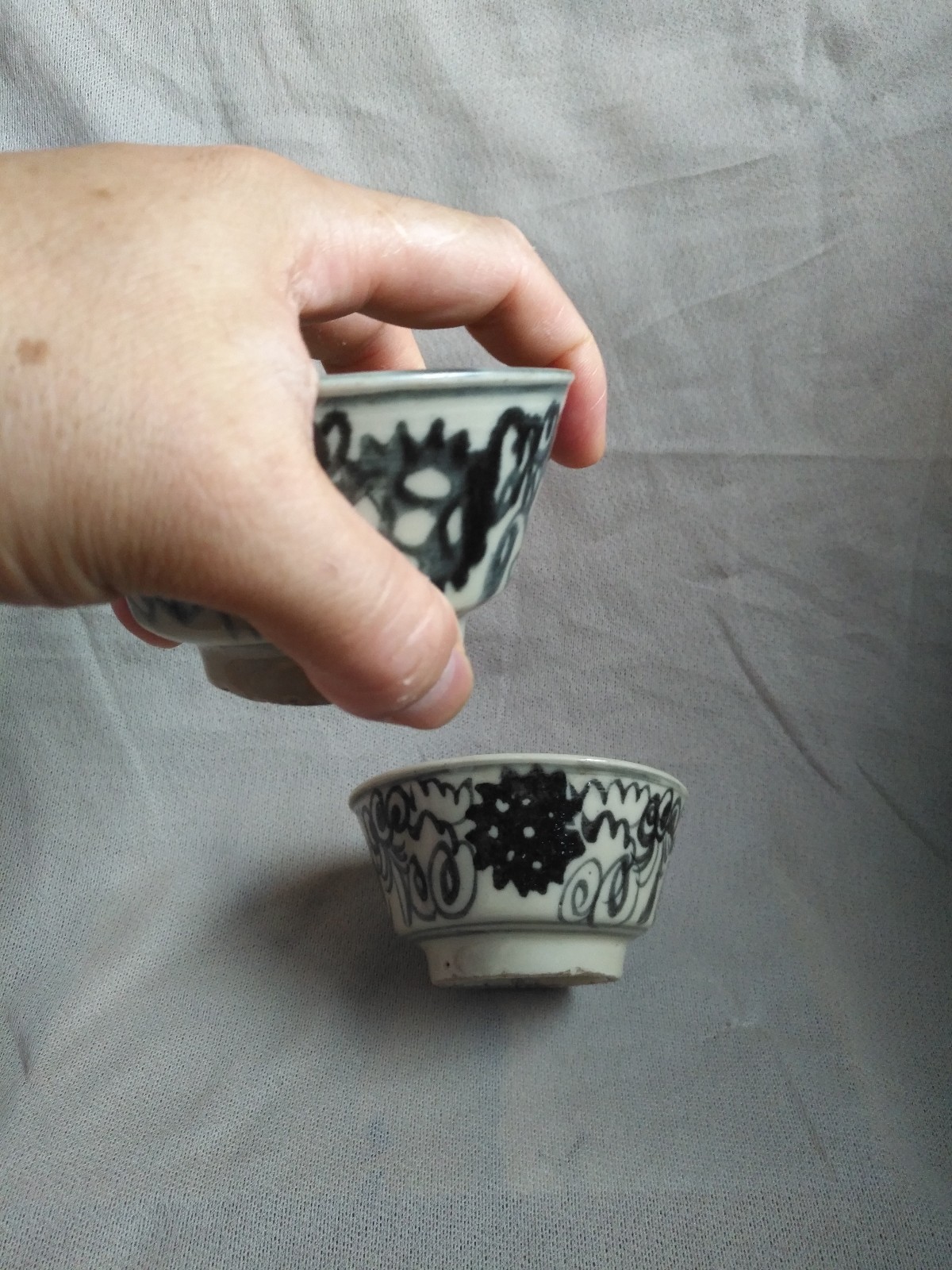 明代黑色青花压手杯_新浪看点