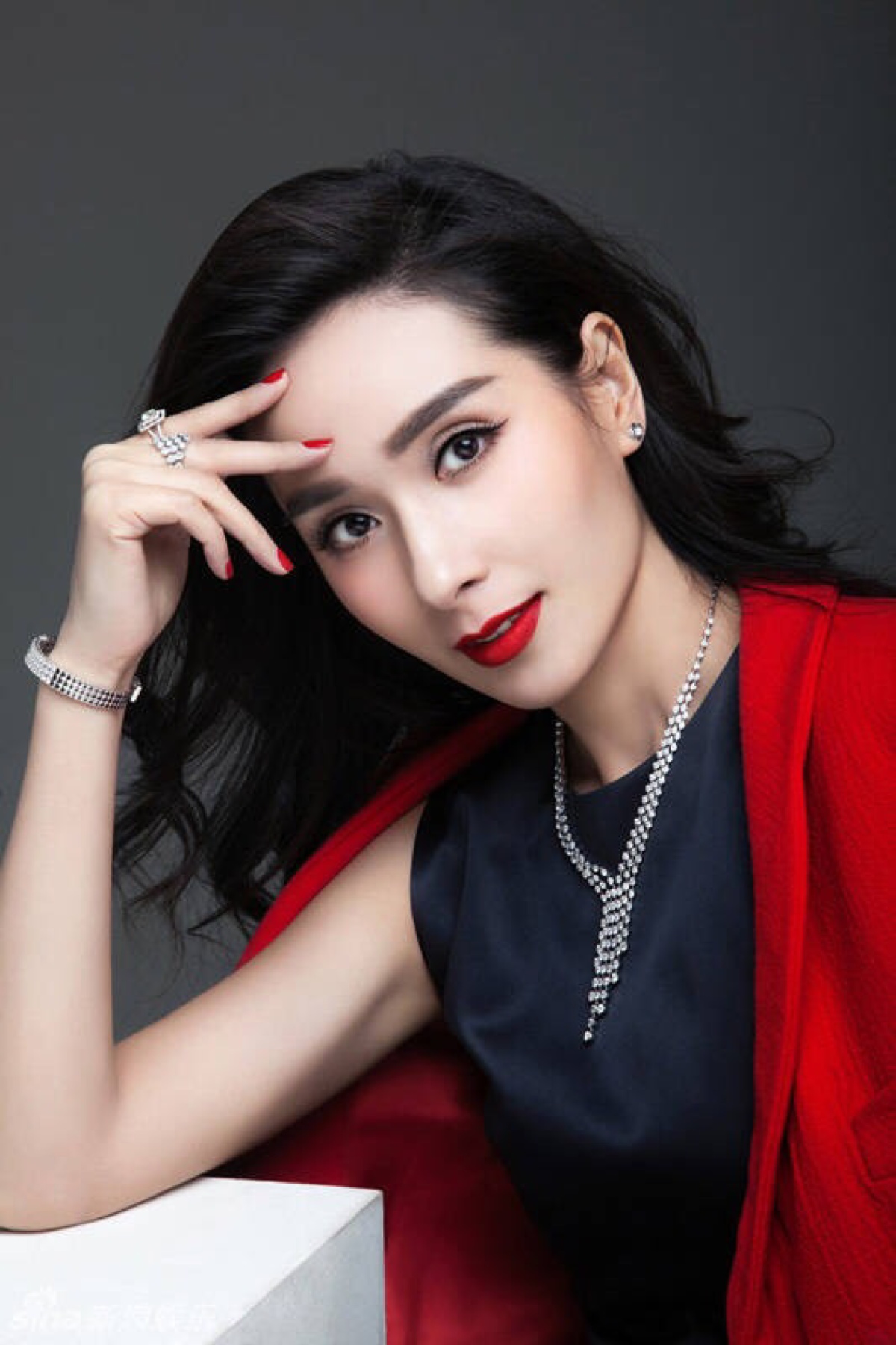 2002年10月,还是《忽然一周,刊登了一篇直指杨恭如"抢人老公"的报道