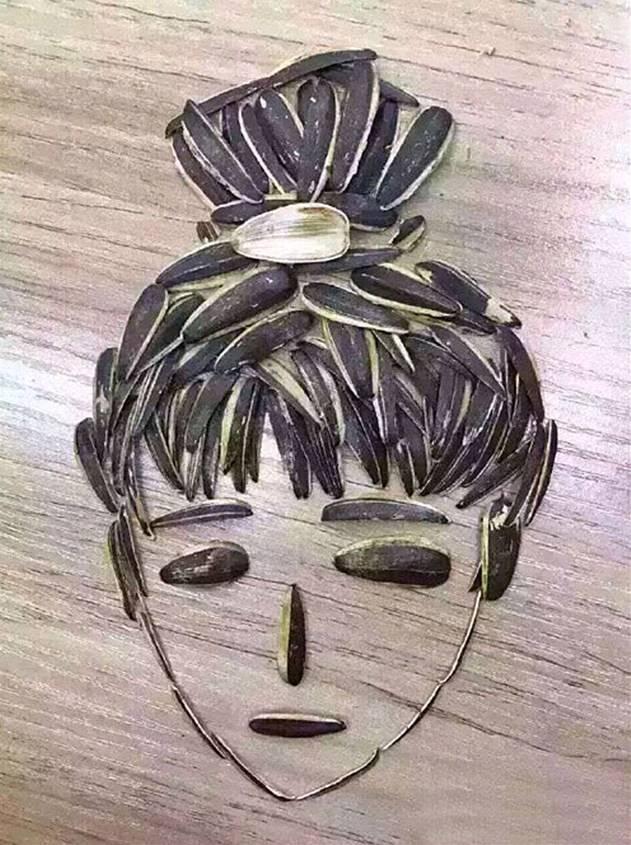 搞笑图片:吃瓜子也能摆的这么文艺,厉害了