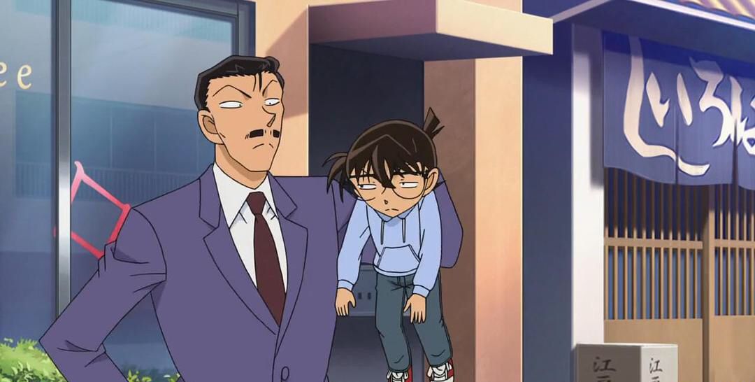 毛利小五郎生气的表情,看样子毛利的大拳头马上就要下来了!