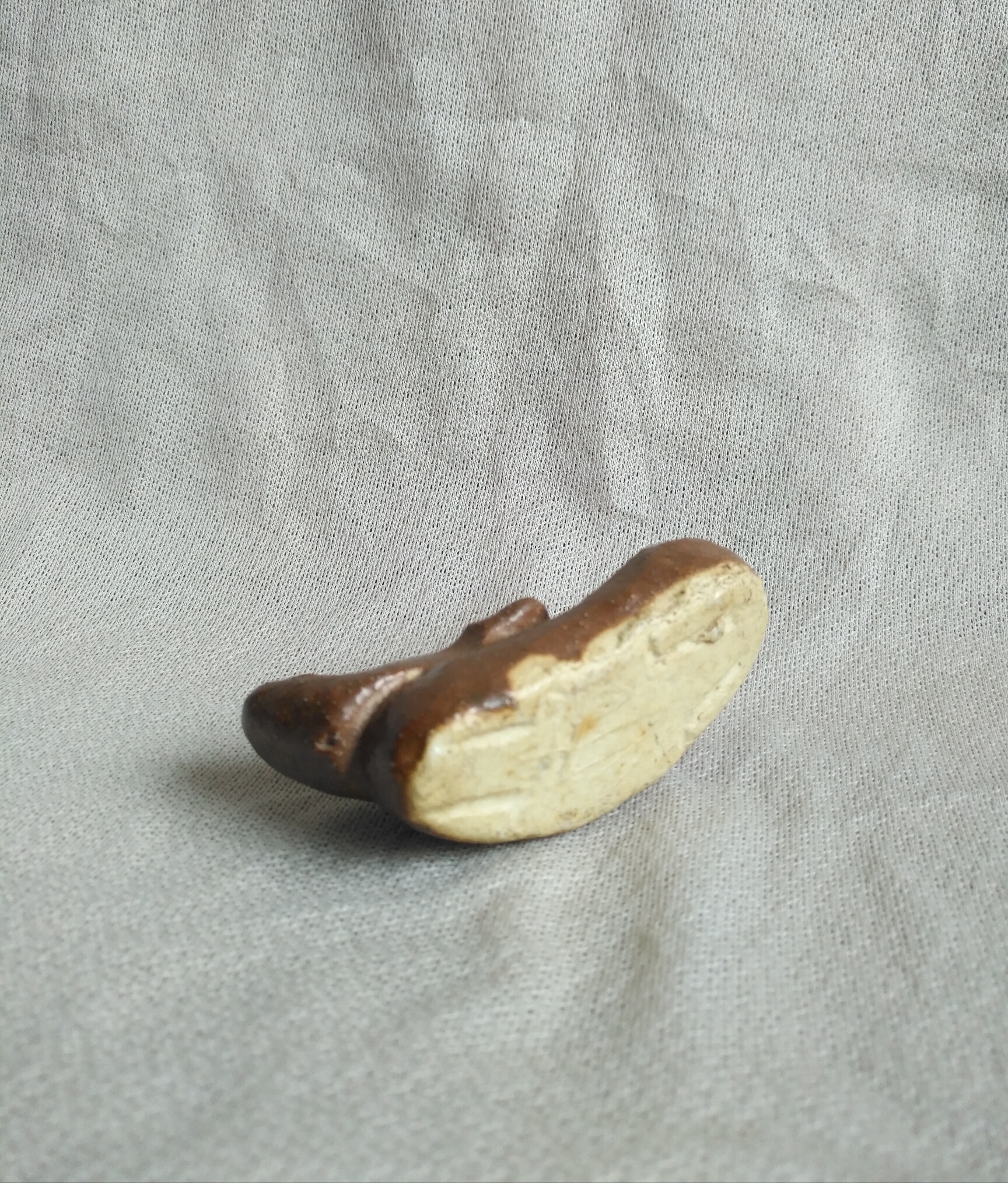 宋代定窑酱釉神兽"呲铁"瓷塑