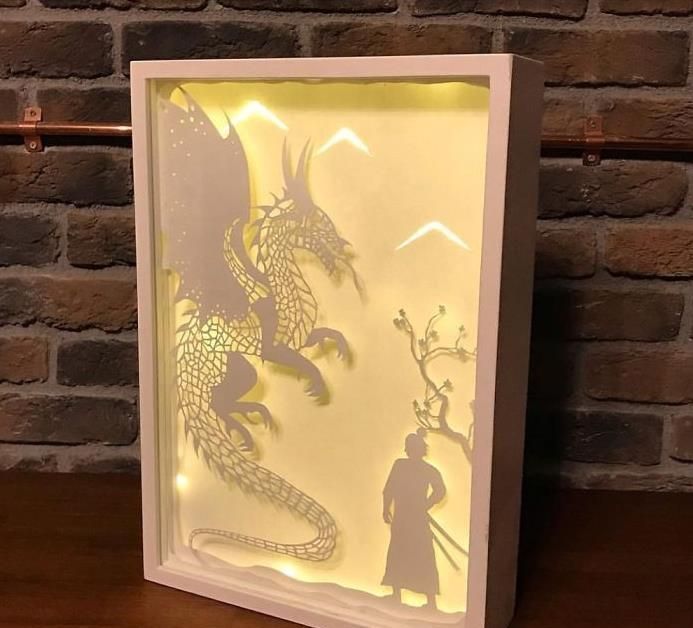 艺术家用剪纸制作超酷手工纸灯箱作品创意满分