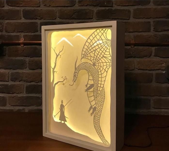 艺术家用剪纸制作超酷手工纸灯箱作品创意满分