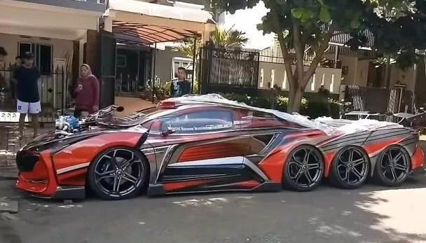 国外小伙用法拉利改装出一天加长版的8轮跑车,驾驶1.85亿!
