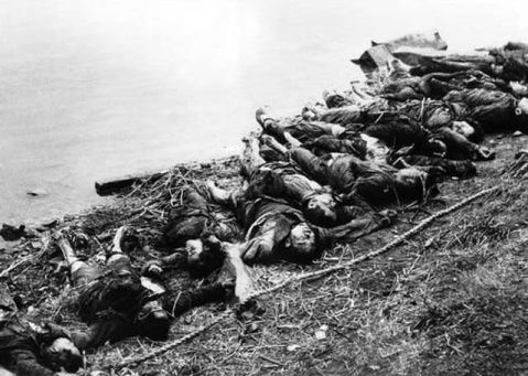 残暴上海解放前夕被俘的解放军被当地保安队枪毙并割头示众