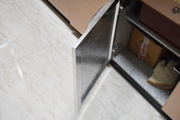 花了35万装修房子,客厅装修很漂亮,厨房装了麻石橱柜,环保耐用