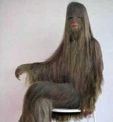 三个奇葩吉尼斯纪录,毛发最多的女人,看着像穿着一身"吉利服"