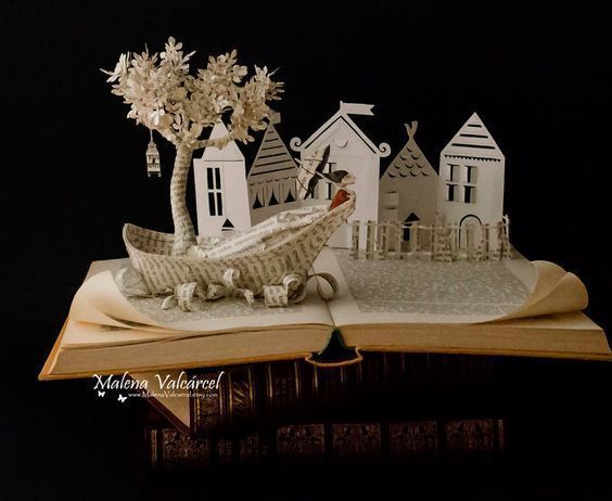 翻开书本进入童话世界纸雕艺术家malenavalcarcel