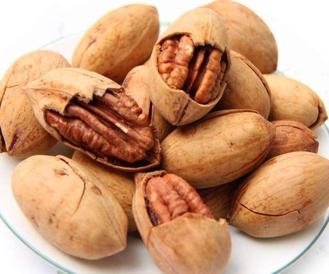 碧根果是世界十大坚果之一又名薄壳山核桃长寿果长山核桃